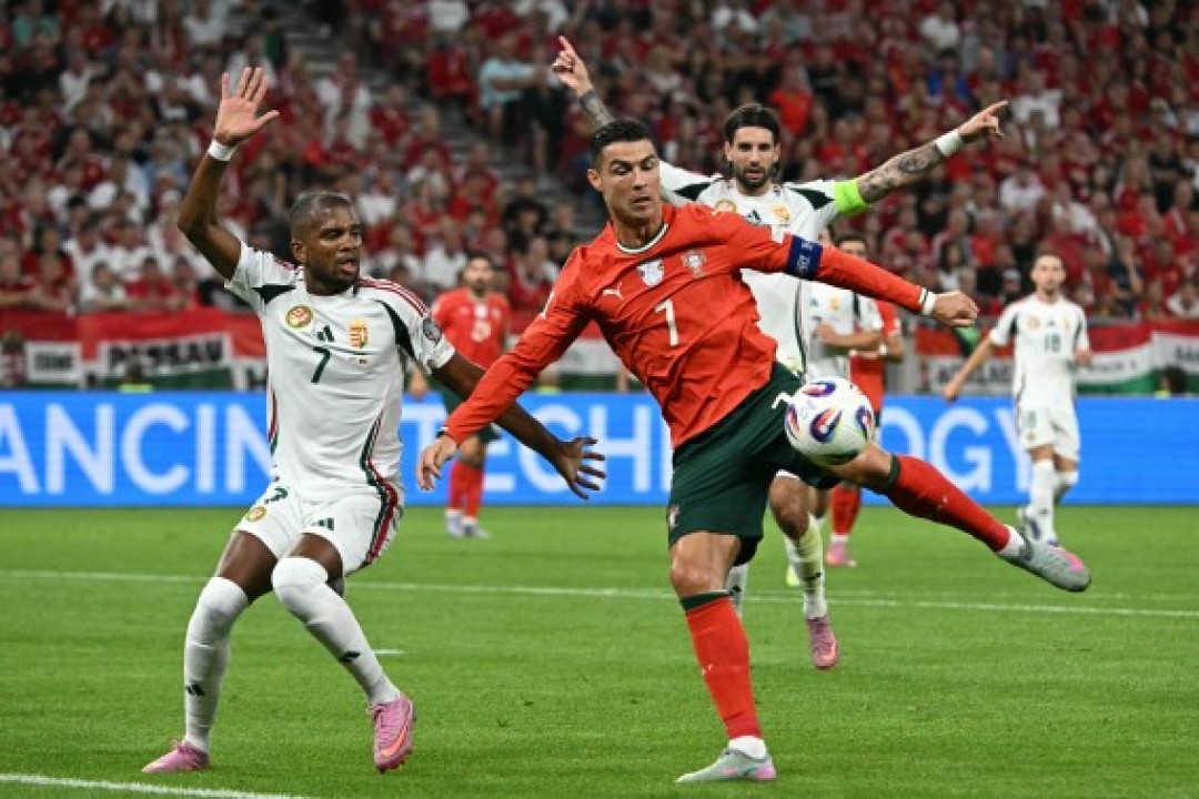 البرتغال تسقط المجر بأهداف رونالدو وكانسيلو